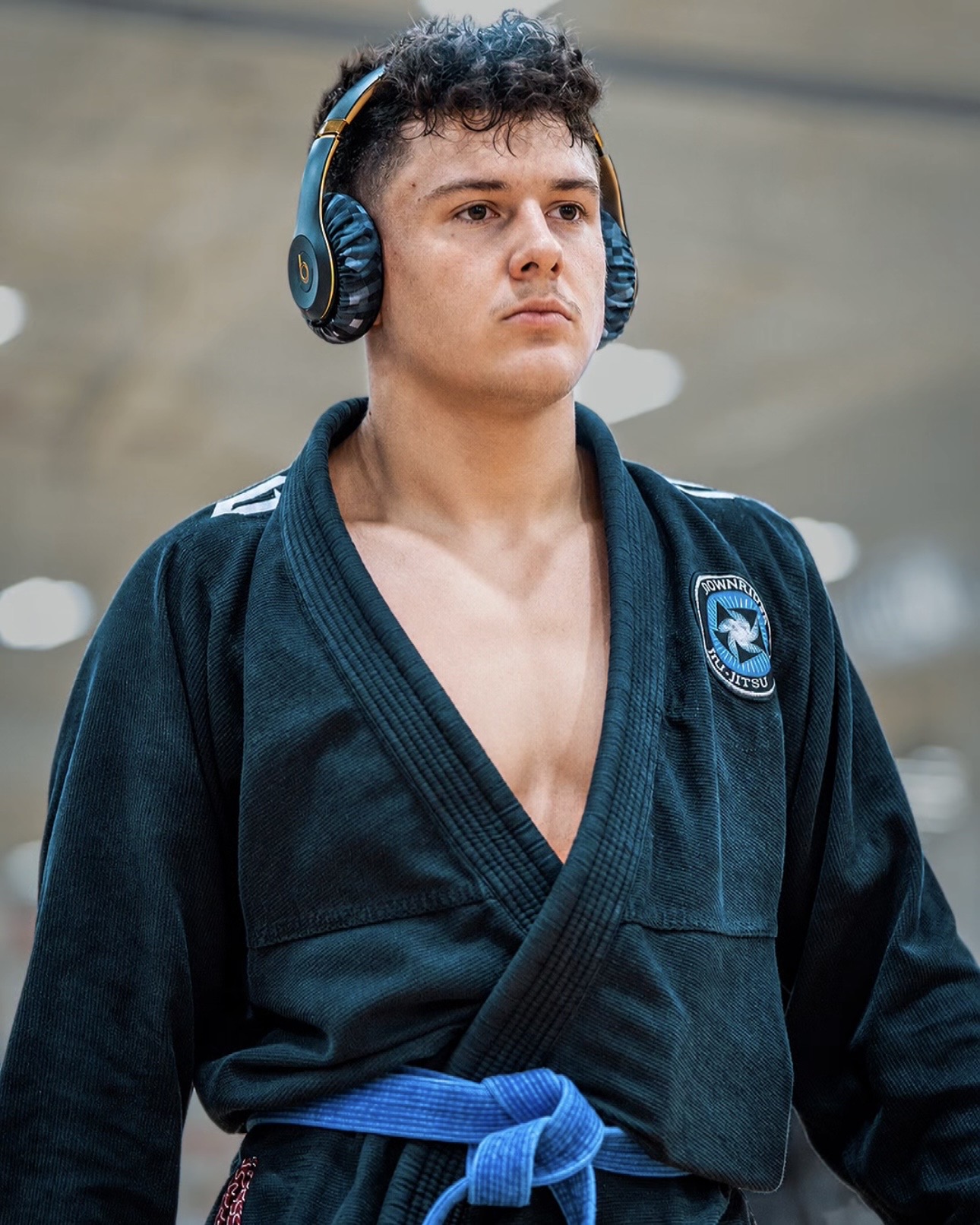 Xzavier Hicks in his Downriver Jiu Jitsu gi and blue belt before a match
